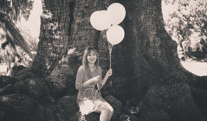Ciera Sitting On Oak Tree With Balloons