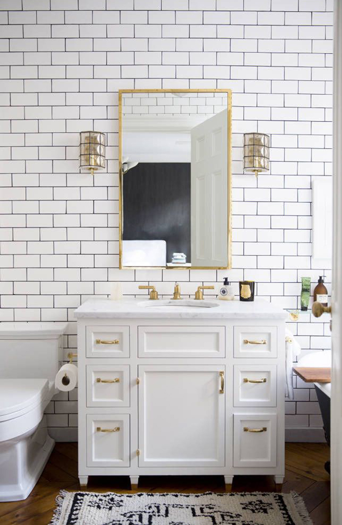 White and Gold Subway Tile Bathroom